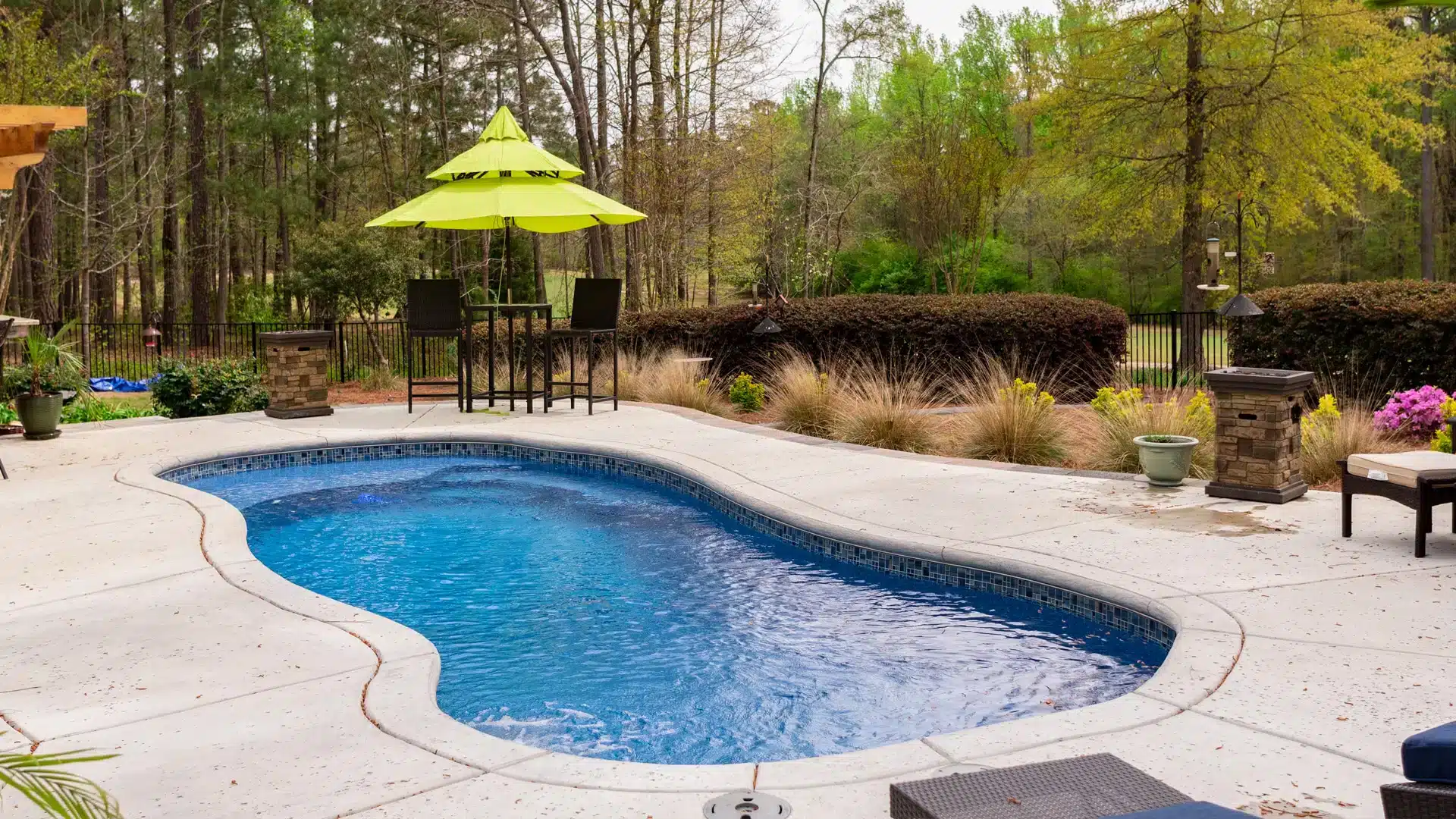 Pool installation with golf course views in the background
