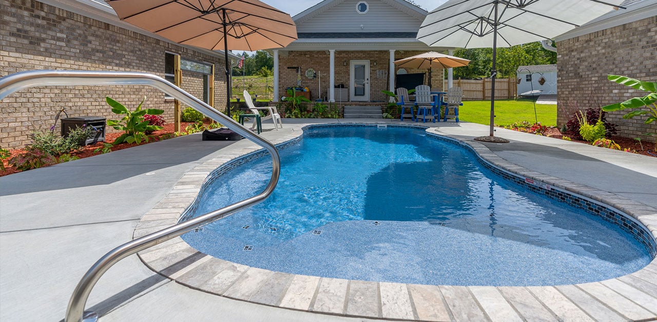Featured image of the Courtyard project with pool as centerpiece of the home